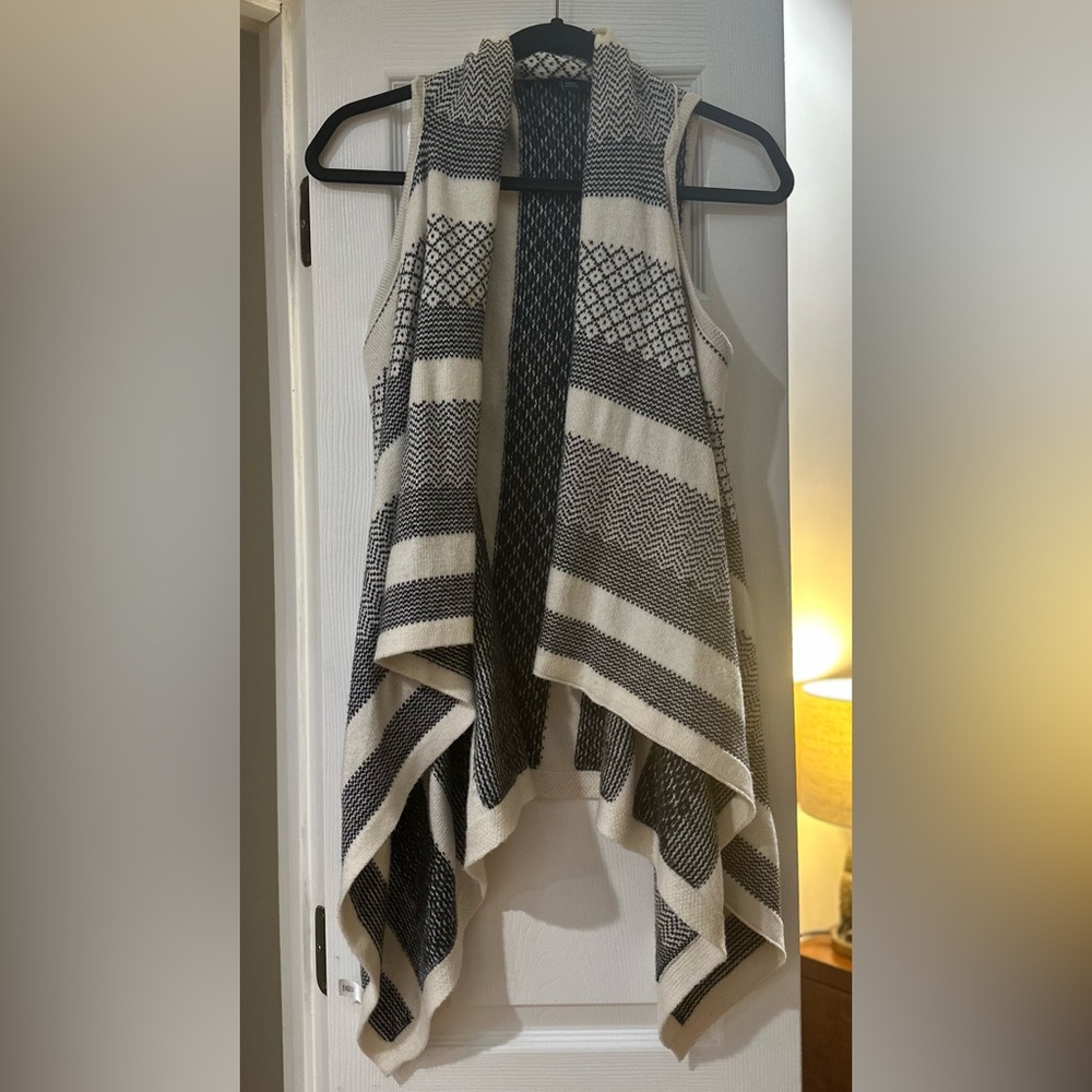 a.n.a. sweater vest. Size S. Gently worn. No stains or tears. Smoke free home.